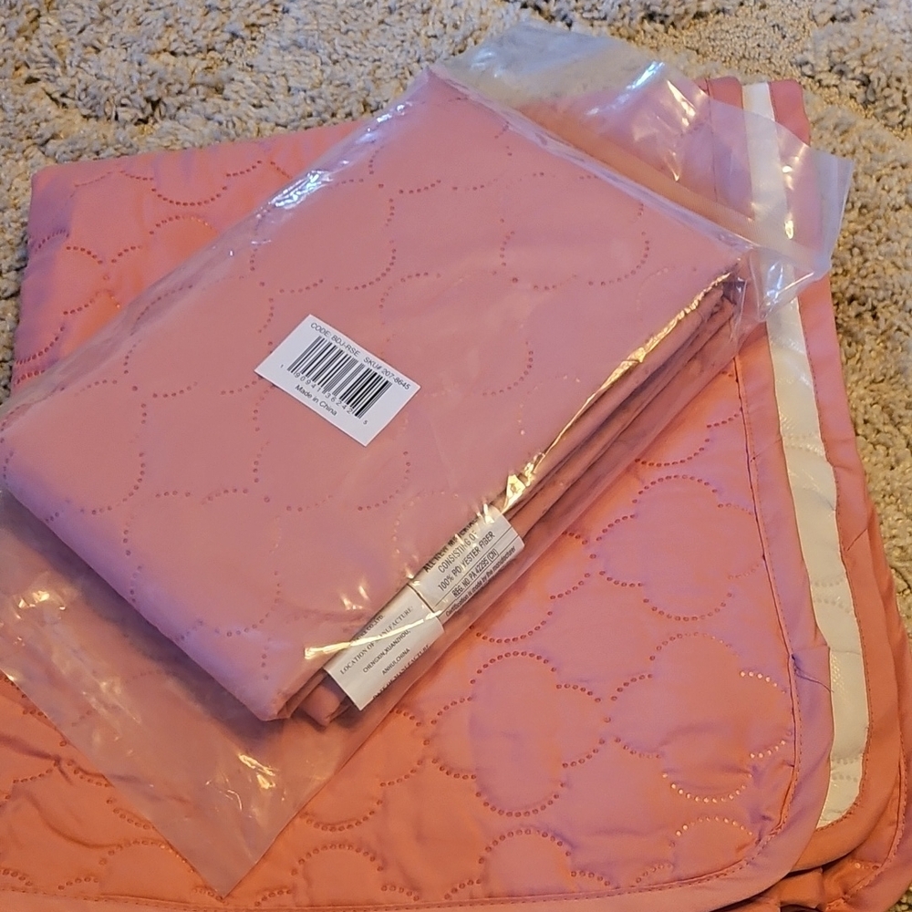 Two Quilted Bed Pads